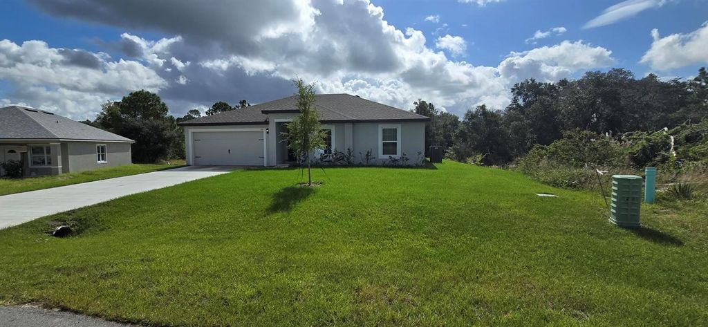 Photo of 310 Amberjack Lane, Kissimmee, FL 34759 (MLS # O6355904)