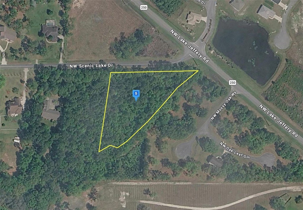 Photo of 200 NW Scenic Lake Drive, Lake City, FL 32055 (MLS # A4708378)