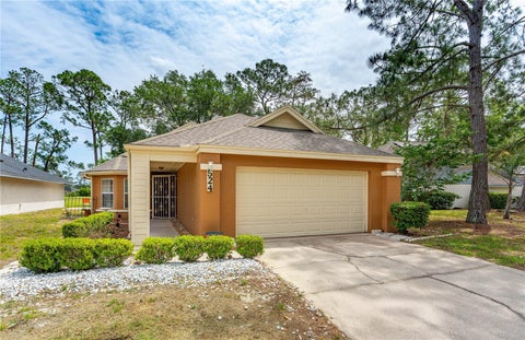 Photo of 524 Crooked Stick Drive, Daytona Beach, FL 32114 (MLS # FC318020)