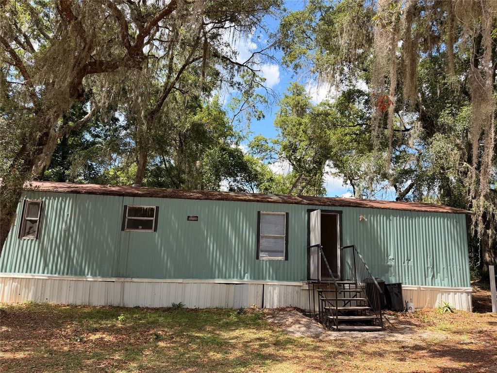 Photo of 4575 NE 167th Place, Citra, FL 32113 (MLS # OM724980)