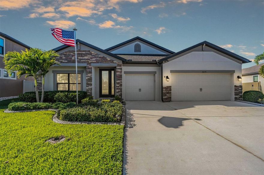 Welcome to 7879 Lago Mist Way. This picturesque one-story home features four spacious bedrooms, three full bathrooms, a three-car garage and filled with upgrades and renovations. Built by MI Homes, the Barcelo floor plan home offers the perfect blend of desired upgrades and serene comfort. The open concept home has a one-of-a-kind kitchen designed for culinary enthusiasts and the hostess with the most. Stainless steel appliances, quartz countertops, matte black faucet with single bowl sink and extended cabinetry with an oversized countertop wet bar with a kegerator, a humidor, ice machine, pull out trash bin, and wine + beverage refrigerator with separate temperature settings and key locks to keep curious hands away. In addition to this amazing kitchen, there's a separate formal dining area, which is perfect, just in time for the holidays! Upgraded with an 8' glass-insert front door, creating a bright space in the foyer, "wood-look" porcelain tile in the kitchen, dining, living room and hallway, upgraded baseboards throughout, crown molding and tray ceilings in various rooms. All bedrooms have laminate "wood-look" flooring, and the bathrooms have ceramic tile. The primary suite is nestled in the back of the house, away from all other bedrooms and includes a walk-in closet with custom shelving, an en suite deluxe bathroom with bathtub, and walk-in shower with double shower heads and separate temperature setting for each one. The living room and dining area feature a shiplap feature wall with electric fireplace. The living room and lanai are upgraded with wired surround sound speakers. Head on over to the outdoor area, the property is fully fenced, equipped with gutters, it features a large yard, upgraded with a screened-in paver patio extension with fire pit, wired speakers, and plenty of room of gatherings. The sellers also upgraded the home with a whole home water softener and water filtration system. This home is walking distance from the Lagoon. Enjoy the resort life! The Epperson HOA quarterly fee is only $225 per quarter and includes cable + the fastest internet in the nation, Ultra-Fi. The Crystal Lagoon Membership Fee is $98 per quarter. The closest Elementary Schools are Innovation Preparatory Academy, Watergrass Elementary School & Wesley Chapel Elementary. The Kirkland K-8 Charter School just a few blocks away and opening soon! The closest middle school is Thomas Weightnman Middle School. The nearest high schools are Kirkland Academy of Innovation High School and Wesley Chapel HS. The community features “Street Leaf” (solar streetlights), home of the first Crystal Lagoon, where Residents have access to Elam Park & the dock at King Lake, Paddle Boarding, Kayaking, a Wibit Obstacle Course, Cabanas, AquaBanas, Sandy Beaches, Live Music Events, Swim Up Bar and Resident Only Events. The Lagoon is like an Outdoor Clubhouse. The Holiday/Seasonal Events include Trivia Night, Family Night, Movies on the Lawn, Sounds of Summer (live music series), Karaoke, Pumpkin Patch in November, Golf Cart parades, Cinco de Mayo Resident only celebration, Fourth of July Resident Only celebration and much more. The Epperson Community Amenities include an Eagle’s Nest Part, a dog park, and golf cart paths. This home is located about 10 minutes away from KRATE, 35 min, north of Downtown Tampa, 45 min. from Tampa International Airport, and 90 minutes from Orlando and Walt Disney World. You are ready for LIFE AT THE LAGOON! Set up a tour today!