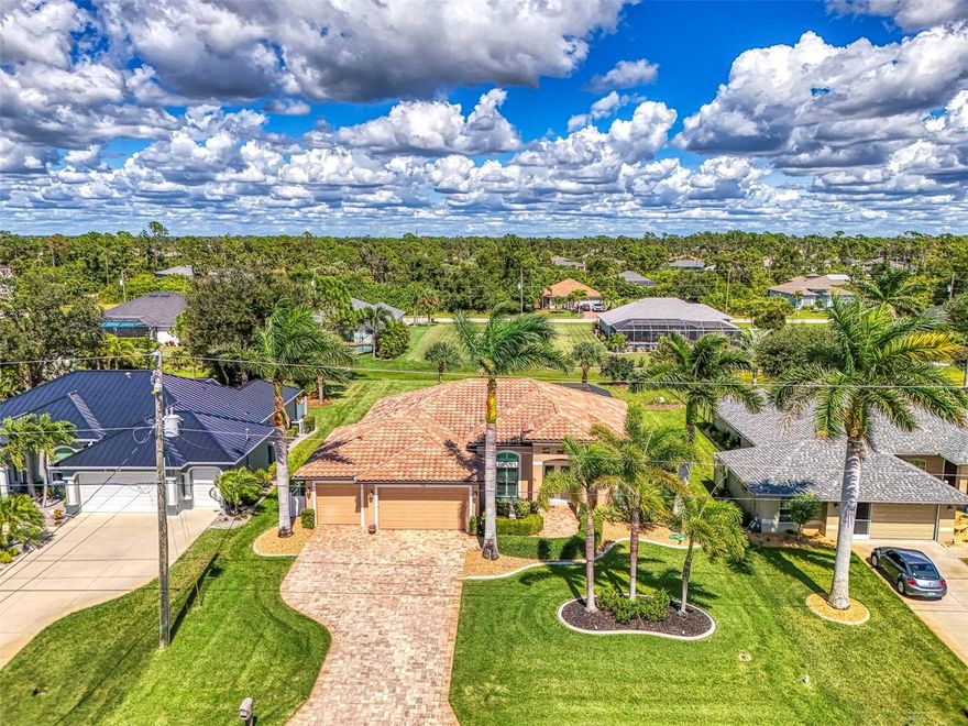 Simply put—this home is gorgeous!!!  Built by Harbor Homes for the current owners in 2015, this 3 bedroom, plus additional office, 3 full bath, 3 car garage, pool home looks brand new.  Located on an attractively landscaped estate-sized lot in the popular community of Rotonda West, this 2295 sq ft. home has been beautifully decorated, lovingly maintained, and continually updated.   It is truly move-in ready.  Features of the home include a tiled roof; paver-tiled driveway, walkway, and pool deck; an oversized 3 car garage with storage,  a heated pool and heated spa with bathroom access from the lanai; an outdoor kitchen; and plantation shutters, window treatments, and crown molding throughout the house.   The home’s open floor plan with high tray ceilings gives a luxurious vibe, and the layout gives a sense of  spaciousness and comfort, and combined with a lovely lanai, pool area, and outdoor kitchen, a great home in which to entertain.  In addition to a dining room, there is a large eat-in breakfast nook off the kitchen with an aquarium window overlooking the pool and lanai.  The great room has sliding glass doors to the lanai and pool area, creating amazing indoor/outdoor living.  The floors are ceramic plank tiles, except for the primary bedroom and office, which are a beautiful hardwood, making clean-up a breeze.   Each bedroom has a walk-in closet and the large walk-in closet in the primary bedroom en suite features 3-drawer shelving units, maximizing storage.  The 3rd bedroom has a murphy bed set up for added versatility in usage of that room.  In the kitchen you will find solid wood cabinets, granite countertops, and stainless steel appliances. Additional features of the home are numerous and are attached with the listing, as is a copy of a survey and elevation certificate.  With an eye toward safety, the home has hurricane-impact windows throughout, and accordion shutters on the front door and lanai.  As per the owners, the home went through 3 hurricanes with no damage!!!  This home is also located in an X Flood Zone, which may make purchasing Flood Insurance optional.  This home will not disappoint! Enjoy Rotonda’s 165-acre community park, 30 mile fresh water canal system and excellent golf courses, along with the area’s sparkling intercoastal waterways, beautiful Gulf of Mexico beaches, miles of walking and biking trails, tennis courts, restaurants, shopping, and world-class fishing.  Make your appointment today.  Time to enjoy the Florida sun!