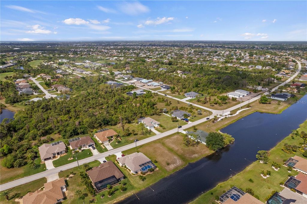 Photo of 805 Rotonda Circle, Rotonda West, FL 33947 (MLS # A4690428)