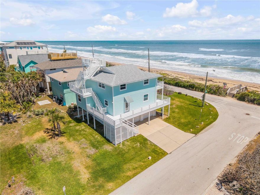 Experience true coastal living in this beautifully renovated direct oceanfront three-story home in New Smyrna Beach. This 3-bedroom, 2-bathroom residence has been completely transformed and offers stunning views and abundant natural light from nearly every room, creating a bright and inviting atmosphere throughout. Perfect as a primary residence or a second beach retreat, the home is ideally positioned to take full advantage of its breathtaking surroundings. Thoughtfully designed for convenience, laundry is located on both the first and third floors. Step outside to enjoy world-class flats fishing and convenient access to a nearby public boat ramp, while incredible sandbars just offshore provide excellent surfing right in front of your home. The expansive rooftop deck delivers unforgettable sunrise and sunset views, along with front-row seats to spectacular rocket launches. A massive garage offers endless space for storing all your fishing and beach gear. Just down the street, you can easily launch your boat into the pristine waters of Canaveral National Seashore, known as the longest stretch of undeveloped Atlantic coastline in Florida. This is a rare opportunity to own a truly special oceanfront property that must be seen in person to fully appreciate.