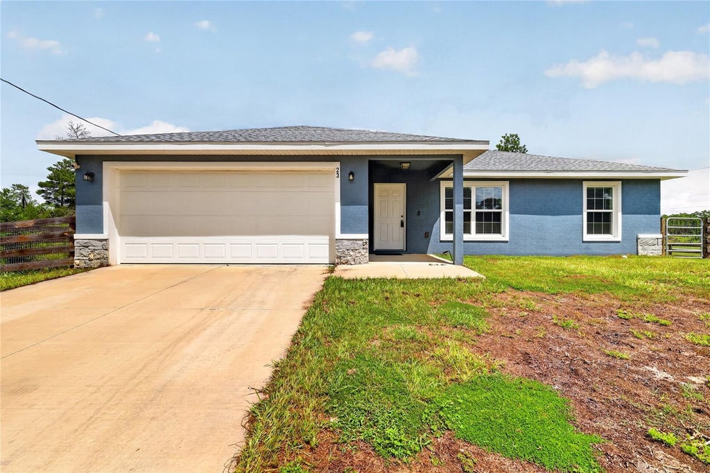 Photo of 23 Fisher Loop Pass, Ocklawaha, FL 32179 (MLS # G5117356)