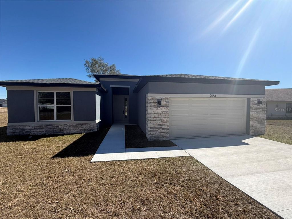 Photo of 7554 SW 129th Place, Ocala, FL 34473 (MLS # OM717484)