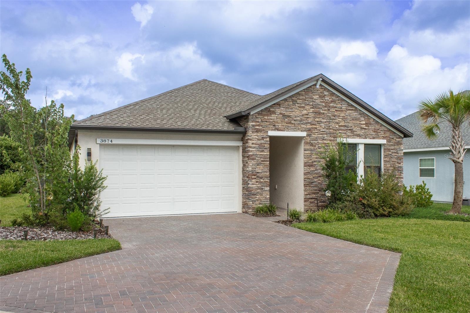 This spacious 4-bedroom, 3-bath home offers a bright and open layout with tall ceilings and a wide foyer with light tile flooring. The private entry features a tall front door that opens to a well-designed floorplan. The living room is open and comfortable with a tray ceiling and upgraded ceiling fans. Outside, a covered paved patio looks out over a beautifully maintained yard with mature trees and landscaping. A fire pit creates a great space for relaxing or entertaining, and a Dyna-Glo stainless gas grill with side griddle and canopy is included. Two bedrooms share a full bath with a double-sink vanity and a separate room for the tub, shower, and toilet. The third bedroom has its own bathroom with a large walk-in shower featuring classic subway tile and a glass door. The primary suite easily fits a king-size bed and additional furniture, and includes a walk-in closet and a private bath with double sinks, a wide walk-in shower with a frosted window, and a private water closet. The kitchen is the centerpiece of the home, with quartz countertops, a large island that seats four, and GE appliances including a 5-burner gas range with stainless hood, wall oven, built-in microwave, and large refrigerator with ice and water dispensers. A deep farmers sink, beverage counter with wine cooler, and hexagon tile backsplash add style and function. The butler’s pantry offers generous cabinetry and counter space, and there’s an enclosed pantry for extra storage.
Other features include a 2-car garage and an irrigation system to keep the yard looking its best. Tankless Water Heater and Teco Gas is connected to this home. City water and sewer services, and a fire hydrant close by for lower insurance rates. This home is move-in ready with high-end finishes and a layout built for both everyday living and entertaining.