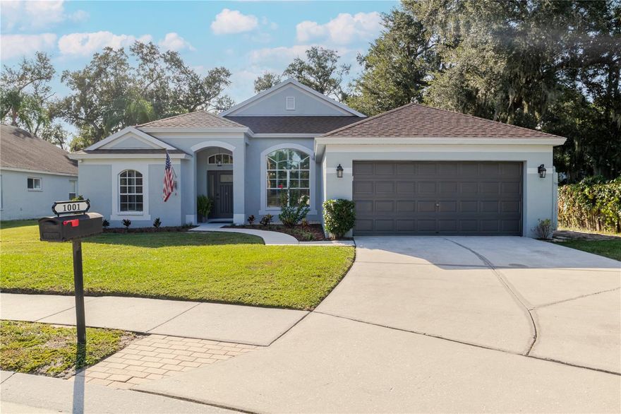 Welcome to 1001 English Bluffs Ct—a beautifully updated pool home tucked away on a quiet cul-de-sac in Brandon! This move-in-ready residence offers the perfect blend of modern upgrades, spacious living, and Florida charm. Step inside to a bright, open-concept layout featuring a fully remodeled kitchen (2022) with white cabinetry, granite countertops, stainless steel appliances, and a large peninsula bar with seating. The kitchen flows seamlessly into the dining and living areas, all bathed in natural light from oversized windows and enhanced by plantation shutters (2022). The main living area, guest bathroom, and flooring (excluding bedrooms) were updated in 2022, creating a cohesive and stylish space ideal for entertaining or relaxing. French doors (2020) lead out to the screened patio and chlorine pool, enclosed by a brand-new screen enclosure (2025)—perfect for enjoying Florida’s sunshine year-round. The primary bathroom, remodeled in 2025, is a luxurious retreat featuring a freestanding soaking tub, glass-enclosed shower with marble-style tile, double vanities, and modern fixtures. Bedrooms are spacious and serene, and a dedicated office space offers flexibility for remote work or study. Additional upgrades include a new HVAC system (2022), roof (2018), and fresh exterior paint (2025). This home truly has it all—style, comfort, and functionality. Schedule your private showing today and fall in love with everything 1001 English Bluffs Ct has to offer!