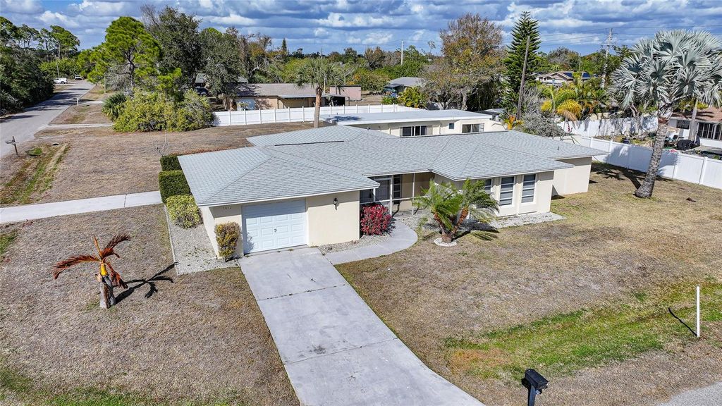 Photo of 1012 Webster Avenue NW, Port Charlotte, FL 33948 (MLS # C7522175)