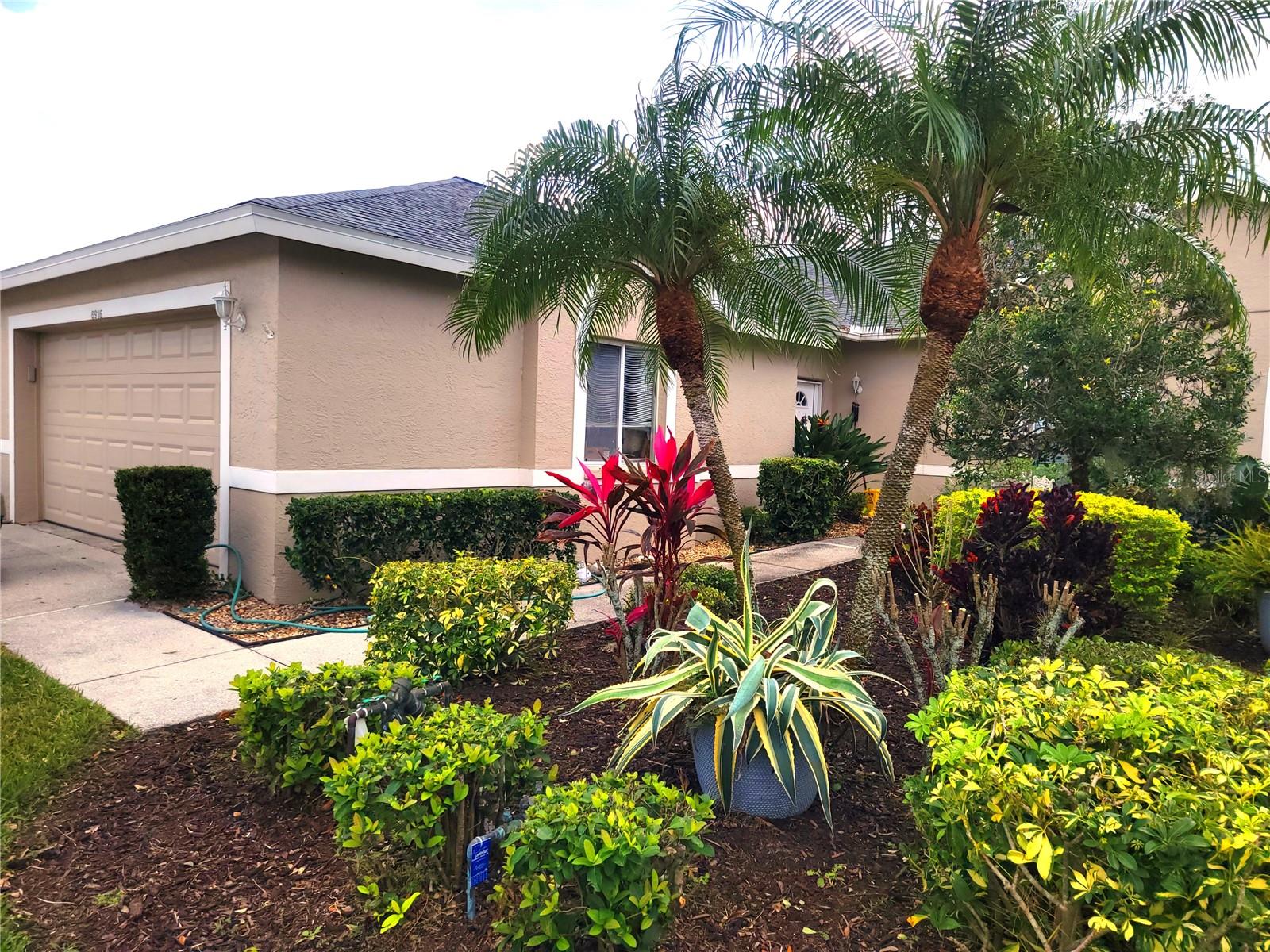 Your Florida Suncoast Country Club lifestyle awaits at this golf course and waterfront view Villa in sought after Tara Golf and Country Club. Tara is a private member only club. Don’t miss this 30’ pond frontage villa that includes a deeded Class ’A’ equity golf membership that transfers to the new owner. It features a spectacular panoramic view of the pond, 8th fairway and 9th tee box golf course. The Villas exterior was recently updated with a new roof in 2023, exterior paint 2022, new community pool pump and heater, irrigation system and more. Plus, the villa’s interior has updated flooring, and the kitchen features extra built in storage, Corian counters, and spacious eat-in sunny and bright space. This spacious 2 bedroom plus Den/Office or extra bedroom, 2 bath, 2 car attached garage villa can also have a 12’x15’ screened lanai added pondside to further enhance your outdoor enjoyment. A Class "A" equity golf membership accompanies this villa with an abundance of amenities including Tara's Championship 18 hole Golf Course, Har-Tru tennis courts, pickle ball plus a new 5 court pickle ball center is under construction and will be ready for play in the fall of 2025. The country club facilities include a Fitness Center with state of the art equipment, hot tub, sauna. The Clubhouse features bar and casual grill room, fine dining, with additional screened patio for outdoor dining. A concession stand at the main clubhouse pool is conveniently located on the turn-around between the 9th and 10th holes. The driving range, short game practice area, putting green, and pro-shop form the hub of daily golf activity. Tara offers something for everyone with a very active social and entertainment calendar. Mandatory fees for full golf membership are $526.56 monthly plus $60.00 food minimum. A one-time Capital Contribution fee of $5000.00 is payable at closing. Quarterly condo association fees for exterior maintenance free living are $1025.00. The Tara Master Association annual fee is $1094.17 that includes Comcast premium bundle for internet and cable TV plus HBO/MAX. This annual fee also includes maintenance of the common area landscaping and the perimeter maintenance of the common grounds. Easy access to I-75, airports, great shopping and UTC mall, arts, theater, entertainment, dining, and the award winning beaches on the Suncoast of Florida. Make The Villas at Tara Golf & Country Club your Florida lifestyle!