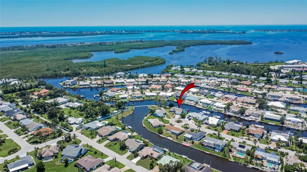 Photo of 5016 Mangrove Point Road, Bradenton, FL 34210 (MLS # A4702846)
