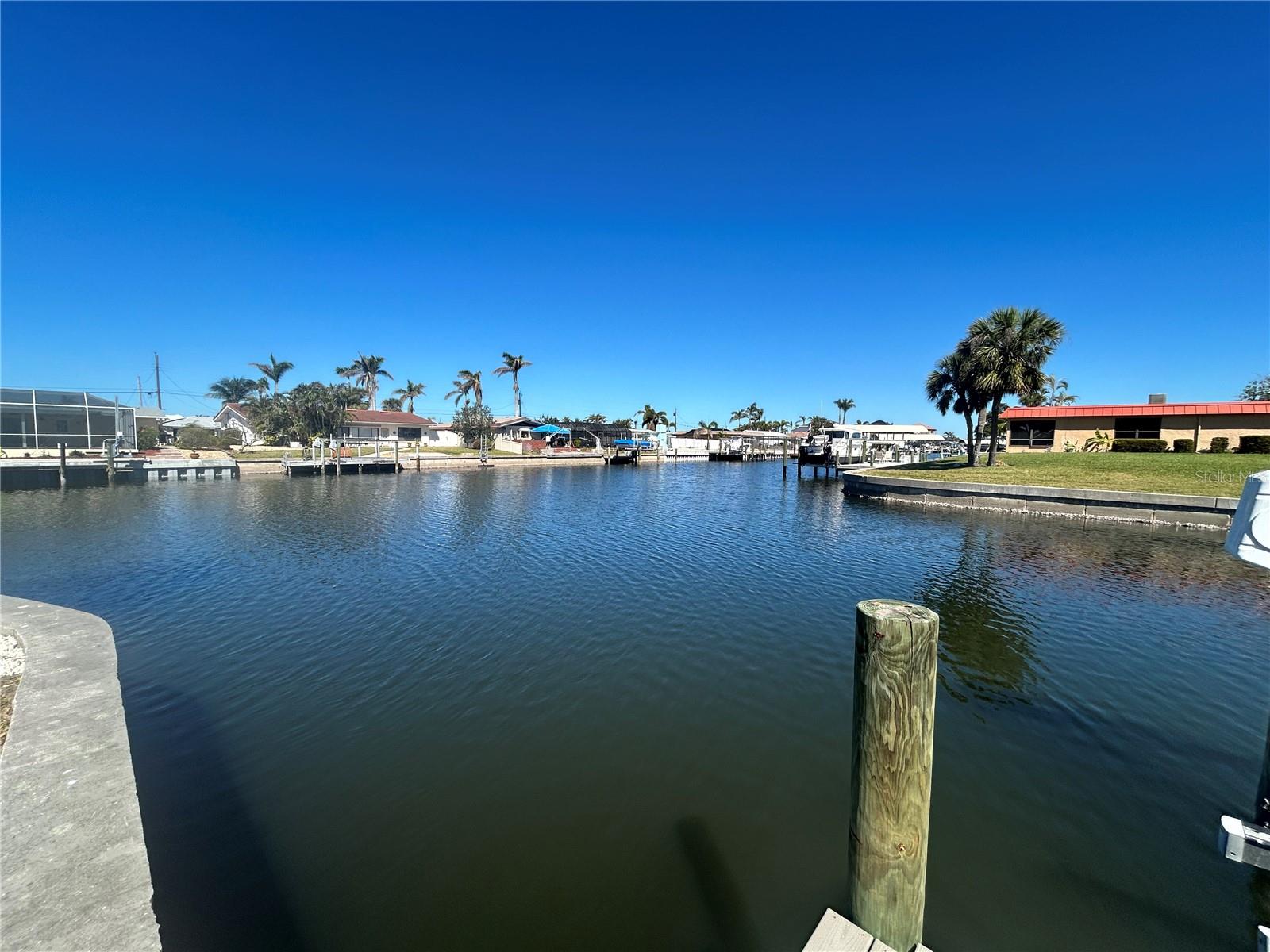Boater's Paradise! This 2BR/2BA waterfront villa is the perfect set up for an avid boater or just someone looking to enjoys sitting outside by the water enjoying the beautiful, serene atmosphere. When you walk into this you are welcomed to a nice bright open floor plan. Living Room/ Dining room combo with white tile flooring. Updated kitchen with grey cabinetry and stainless-steel appliances. Florida room overlooking the waterway. Both bedrooms feature vinyl flooring (no carpet throughout) This is an end unit no obstructed views of the water on the side of the house or the back yard. Paver decking perfect for entertaining just bring your BBQ. This villa comes with a boat lift, save money on boat storage and have your boat right outside for boating anytime! Property received no damage from the hurricane. The community of Palma Sola Harbour is gated and features a heated pool and clubhouse. Fantastic location one bridge away from the gorgeous Gulf beaches on Anna Maria Island. Rent includes basic cable and internet. Owner will permit a small dog. Don't miss this Gem of a home and come make paradise your home! Call today to schedule a showing.