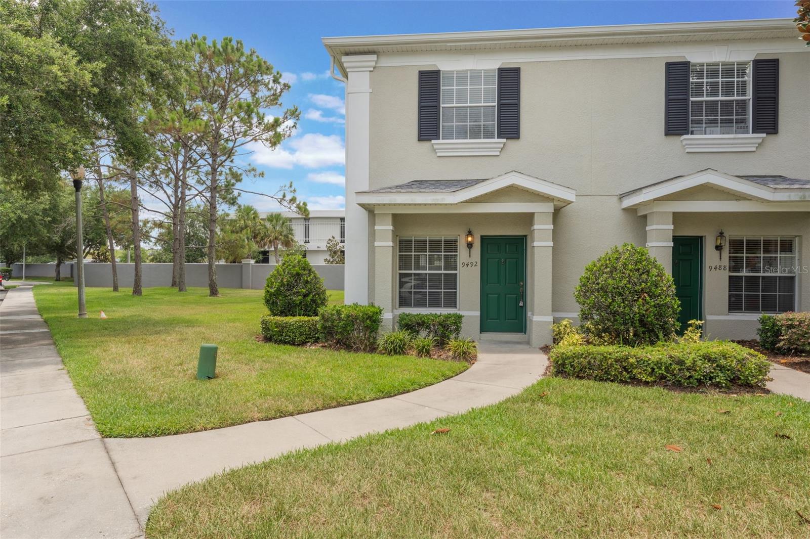 Lowest priced home in all of Lake Nona! Don't miss out on this rare opportunity on a corner unit in a gated Lake Nona Community with sought after school districts! Move in ready 2 bedroom 2.5 baths with double master suites, laminate floors in bedrooms and stairs plus walk in closets. 42" cabinets in kitchen complete with all the appliances overlooking the spacious family room with ceramic tile on the first floor and no carpets. Indoor laundry. Screen enclosed covered patio with storage room and no rear neighbors. Roof replaced in 2022. Community offers a playground, pool and the aforementioned gated entry. Location benefits include all of what Lake Nona has to offer including but not limited to shopping, restaurants, golf courses, parks, 45 minute drive to the beach along with easy access to SR 417, SR 528, SR 408, The Florida Turnpike, Downtown Orlando and The international airport.