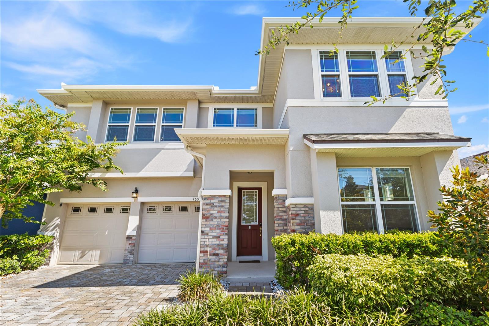 This stunning 4-bedroom, 3.5-bath residence sits proudly in the highly sought-after Hawksmoor community of Winter Garden. Designed with a modern open-concept layout and upgraded with premium finishes, this home blends elegance, functionality, and comfort.
Perfectly positioned near the Orange County National Golf Center and Lodge—home to the nation’s largest driving range—this property also offers quick access to Orlando Health Hospital, brand-new top-rated schools, shopping, fine dining, and entertainment. With Highway 429 just minutes away, world-famous Orlando theme parks are practically at your doorstep.
Step inside and be welcomed by soaring ceilings and a bright, spacious floor plan. The luxurious primary suite with a spa-inspired ensuite is conveniently located on the main level, while the second floor offers three beautifully designed bedrooms, a bonus living/play area, and ample space for family or guests. A flex room on the first floor can serve as a home office, library, or formal dining area.
At the heart of the home, you’ll find a chef’s kitchen featuring stainless steel appliances, custom 42" cabinetry, oversized granite island seating up to six, walk-in pantry, and butler’s bar connecting to the dining/flex space. Perfect for both everyday living and entertaining.
Outside your door, Hawksmoor provides resort-style amenities, including a zero-entry pool with splash area, clubhouse with private rental options, fitness center, yoga lawn, Zen garden, and community walking trails around picturesque lakes and ponds.
This is more than just a house—it’s a lifestyle. Don’t miss the chance to make this exceptional property your new home in one of Winter Garden’s most desirable communities.