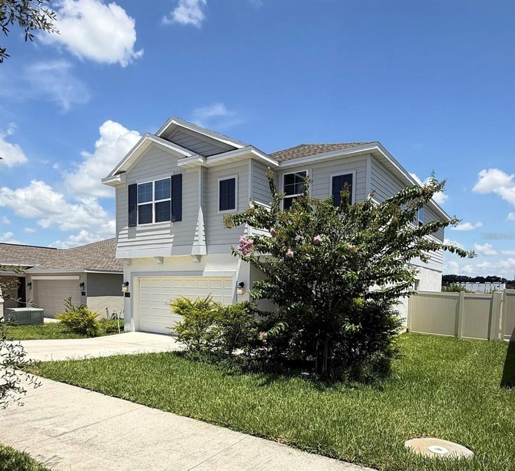 Photo of 827 Ofanto Way, Haines City, FL 33844 (MLS # TB8532812)
