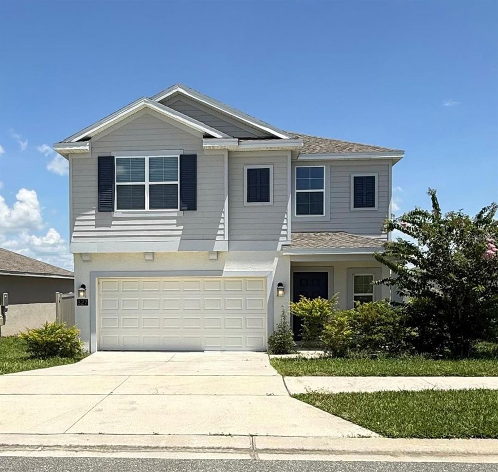 Photo of 827 Ofanto Way, Haines City, FL 33844 (MLS # TB8532812)