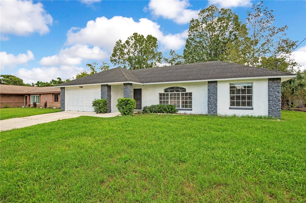 Photo of 2113 N Normandy Boulevard, Deltona, FL 32725 (MLS # O6443999)