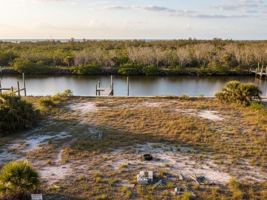 This stunning .13 acre lot with direct Gulf access is ready for your coastal dream home! Experience the ultimate coastal lifestyle on this prime vacant lot, perfectly situated just moments from the salty breeze and vibrant sunsets of Hudson Beach. Whether you’re envisioning a stilted architectural masterpiece or a cozy weekend retreat, this cleared homesite offers the ideal canvas for your Florida dream home. With local boat ramps, waterfront dining, and the popular Sunwest Park nearby, you’ll have seamless access to the very best of Gulf Coast living.