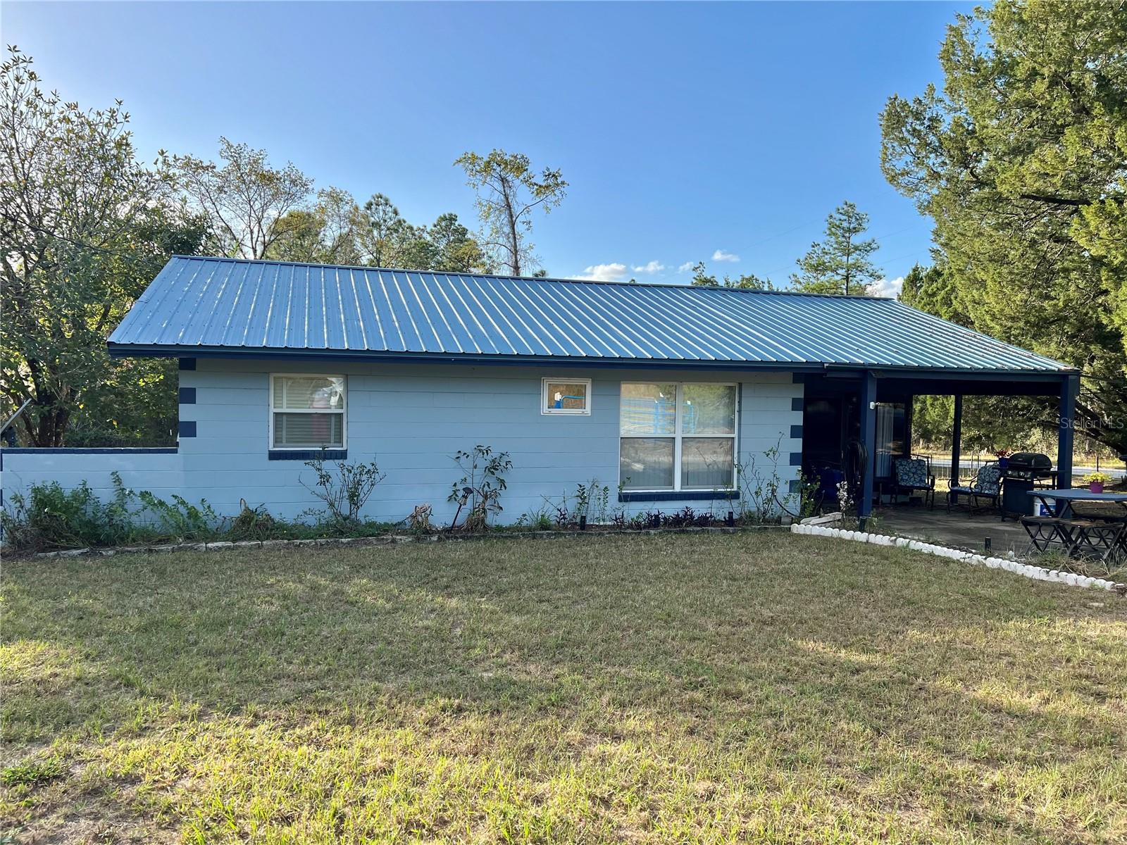 Come view your new fully furnished home nestled right in Dunnellon, Fl. This home is perfect for an investment property, rental, simple living a snowbird looking for the right place to be your vacation home! This 2/1 sits on the corner of a .99 Acre lot with so much potential! This home has a updated metal roof(2019), Updated A/C 2023, and an updated breaker panel(2024).