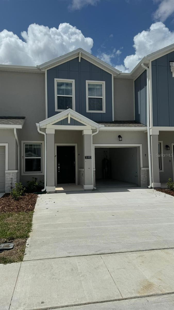 Stunning 3-bedroom, 2.5-bath townhouse in Davenport! Only 1 year old, impeccably maintained, with modern finishes , 1-Car garage plus 2 additional parking spaces at front, and plenty of natural light. Enjoy community amenities—pool, playground, and landscaping included and maintenance-free!