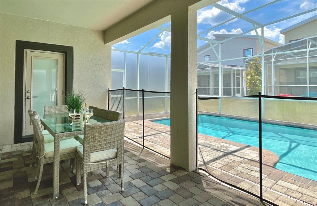 Photo of 830 Drop Shot Drive, Davenport, FL 33896 (MLS # O6342105)