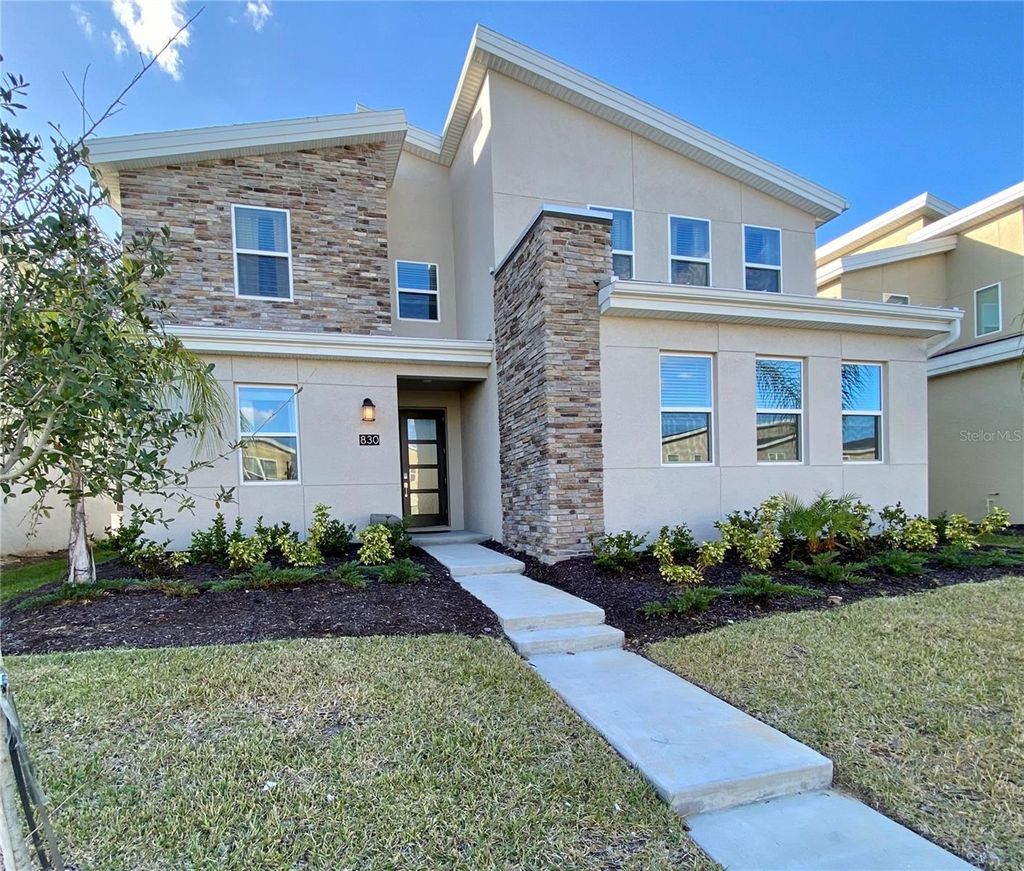 Photo of 830 Drop Shot Drive, Davenport, FL 33896 (MLS # O6342105)