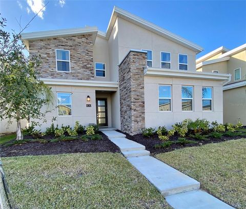 Photo of 830 Drop Shot Drive, Davenport, FL 33896 (MLS # O6342105)