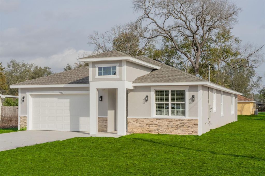 Photo of 9119 SE 155th Place, Summerfield, FL 34491 (MLS # OM718541)