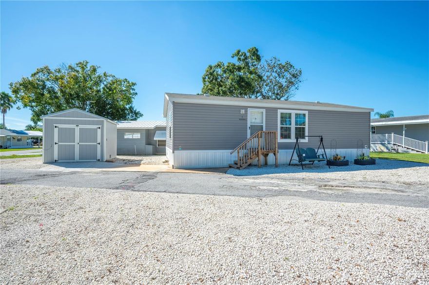 Introducing the 2024 Kingswood Model by Nobility, the newest home available in the highly sought-after Saddlebag Lake Resort, a 55+ gated community in Lake Wales. This beautiful 2-bedroom, 2-bath home is perfectly situated on a desirable corner lot, directly across from the clubhouse and community amenities. Inside, you’ll find an open concept floor plan with a spacious kitchen that includes an island with sink, a designated dining area, and an inside utility room complete with washer and dryer. Easy-to-clean flooring flows throughout the home for low maintenance living. Both bedrooms are private en-suites, offering comfort and convenience, while the exterior is designed with a maintenance-free yard and no grass to mow. Just beyond the backyard is a greenway that leads directly to the water, giving you easy access to the lake and a serene outdoor setting.

Saddlebag Lake Resort is a resident-owned community known for its vibrant and welcoming atmosphere. Residents enjoy peace of mind with 24-hour gated security and an array of resort-style amenities. The community offers a heated swimming pool, hot tub, sauna, clubhouse, library, and billiards room, as well as a fitness center and exercise facilities. Outdoor recreation includes tennis and pickleball courts, shuffleboard, horseshoes, a driving range, and a dog park. The community is golf cart friendly, making it easy to navigate the grounds. For water enthusiasts, there is a boat ramp, fishing pier, and direct access to Saddlebag Lake, which is well known for its bass, crappie, and bluegill fishing. The community also features a private U.S. Post Office and hosts frequent social activities such as parades, bingo, card games, clubs, and live entertainment, ensuring there is always something to do.

The location is ideal, situated just nine miles from downtown Lake Wales where shopping, dining, and medical facilities are easily accessible. Major routes including US-27 and SR-60 provide convenient access to Orlando, Tampa, Vero Beach, Bok Tower Gardens, Lake Kissimmee State Park, and Legoland. Homes in Saddlebag Lake Resort are designed for easy living with minimal exterior upkeep, allowing residents to focus on enjoying the community’s active lifestyle. HOA fees include maintenance of common areas, amenities, and security, providing excellent value.

This 2024 Kingswood Model blends modern design with resort-style living, offering the perfect combination of comfort, convenience, and community in one of Central Florida’s most desirable 55+ neighborhoods.