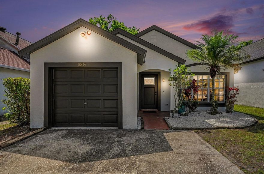 Rarely available CARROLLWOOD GEM! This turn-key home is loaded with big-ticket upgrades: BRAND NEW ROOF, FRESHLY PAINTED EXTERIOR AND INTERIOR, A/C replaced in 2018, and BRAND NEW LAMINATE FLOORING throughout. This cozy home offers SOARING CEILINGS and a SPACIOUS LIVING/DINING ROOM COMBO that enjoys an open pass through to the kitchen, well appointed with all stainless steel appliances including gas stove, gas hot water heater and gas or electric dryer. The primary suite is serene and boasts a generous walk-in closet. The two guest rooms are nicely sized and their shared bath has been recently updated! The sliders offer a ton of natural light and welcome you to your fully fenced yard! The backyard is a private oasis featuring a SHADY CABANA/GAZEBO for hot summer days. Let the entertaining and relaxation begin with festive outdoor lighting and stepping stone patio, perfect for a firepit if you'd like! It's a wonderful place to start the day with a coffee and end the day with your favorite cool beverage! The storage shed adds value to this already well priced home! Within walking distance to amazing Carrollwood Village amenities including the fantastic park and Cultural Center! Ring doorbell, new smoke alarms and so much more await! Act fast—this one won’t last!