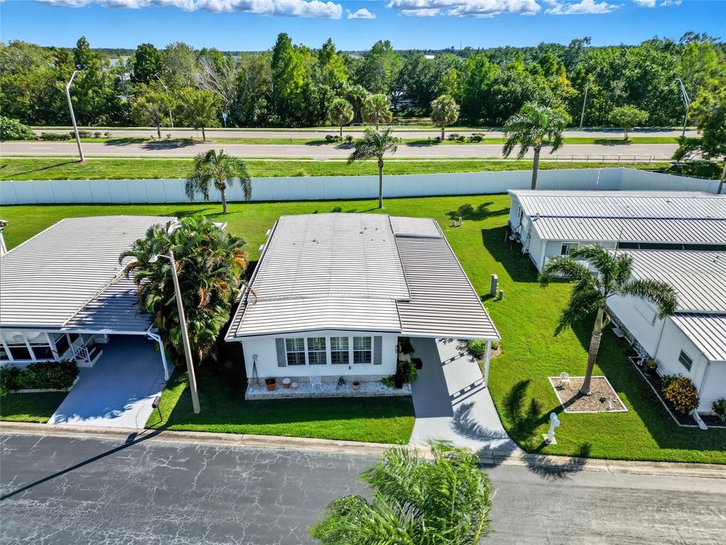 Photo of 10472 Peaceful Drive, Largo, FL 33773 (MLS # TB8430815)