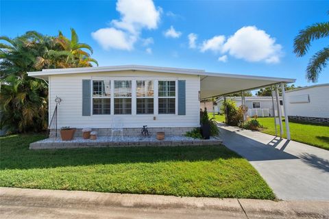 Photo of 10472 Peaceful Drive, Largo, FL 33773 (MLS # TB8430815)