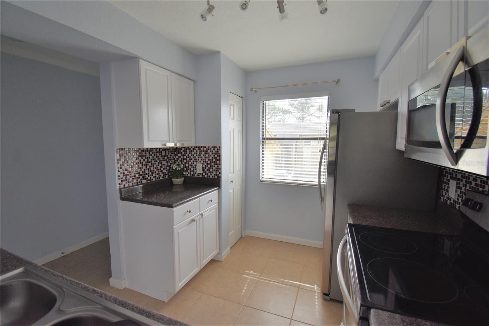 10177 SAILWINDS BOULEVARD S 203