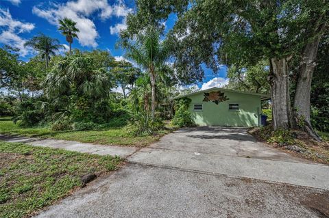 Photo of 416 Woodward Avenue, Oldsmar, FL 34677 (MLS # TB8431444) Photo of 416 Woodward Avenue, Oldsmar, FL 34677 (MLS # TB8431444)