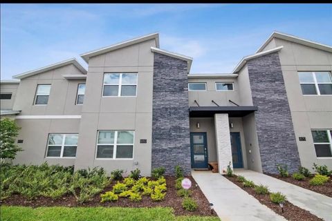 Photo of 880 Pebble Beach Drive, Davenport, FL 33896 (MLS # O6330010)