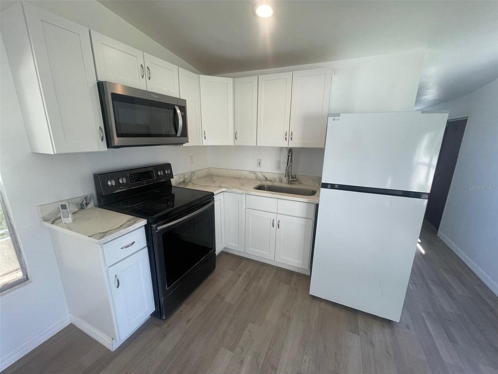 Photo of 7489 Charlin Parkway, Orlando, FL 32822 (MLS # O6424592)
