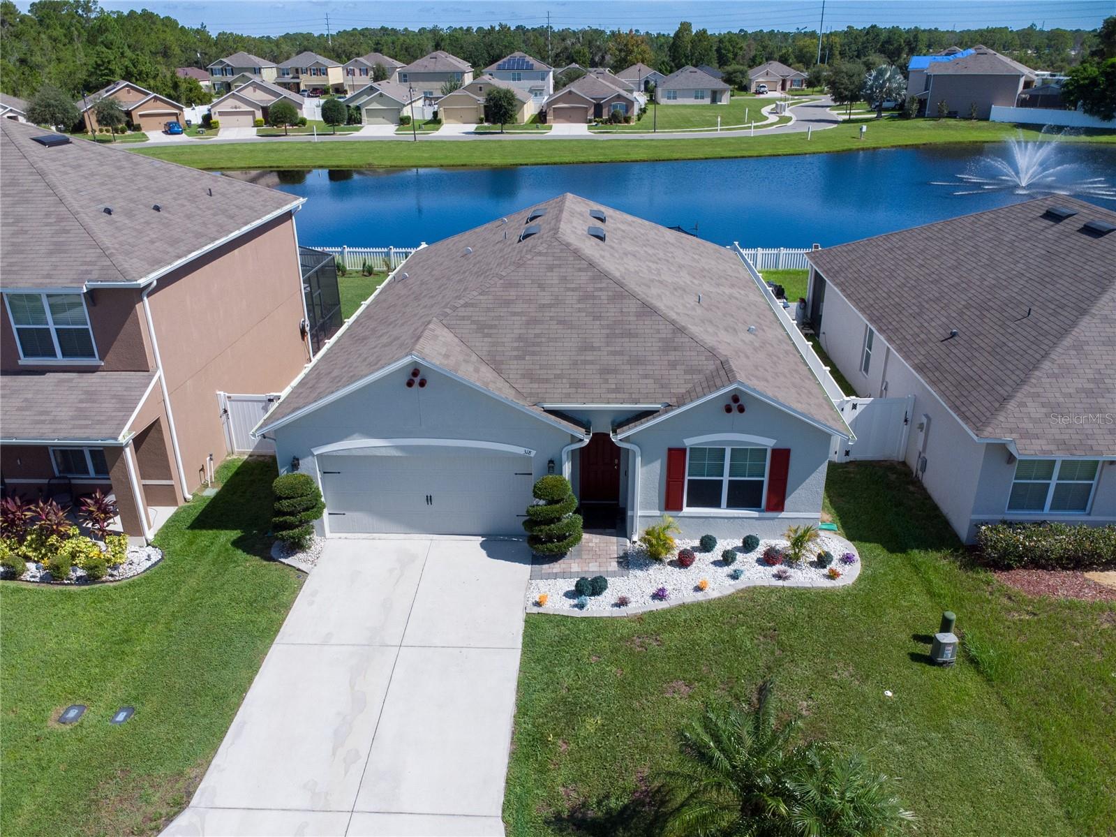 Don't miss this incredible opportunity to own a beautifully maintained 4-bedroom, 2-bathroom single-family home with a serene water view in the desirable Briarwood community of Davenport, Florida! This spacious home offers a well-designed split floor plan with an abundance of natural light, vaulted ceilings, and tile flooring throughout all main living areas for easy maintenance and style.
The heart of the home features a bright and open kitchen with ample cabinetry, a breakfast bar, and a cozy dining area , perfect for casual meals or entertaining guests. The living room flows effortlessly from the kitchen and offers peaceful views of the backyard and water beyond, creating a tranquil atmosphere to relax and unwind.
The oversized primary suite is privately located and includes a large walk-in closet and an en-suite bathroom with dual sinks, a soaking tub, and a separate shower. Three additional bedrooms gives plenty of space for guests, family, or even a home office setup.
Step outside to a covered and screened-in lanai that overlooks a beautifully landscaped fenced-in backyard with no rear neighbors and tranquil water views , ideal for morning coffee, sunset dinners, or weekend barbecues. There's plenty of room for outdoor seating, pets, or even a future pool.
This home is perfect as a primary residence, second home, or investment property, with low HOA, no CDD, and short-term rental zoning permitted. Whether you're looking to settle in or generate income through vacation rentals, this home checks all the boxes.
Located just minutes from ChampionsGate, I-4, Posner Park, shopping, dining, golf courses, and Orlando's world-famous theme parks, this home offers unbeatable convenience while still providing peace and privacy in a quiet neighborhood.
Easy to show and move-in ready, schedule your private tour today and experience Florida living at its best!