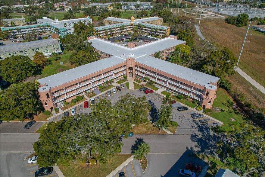 Welcome to easy, carefree living in this third floor, one bedroom, one bathroom condo located in the highly sought after On Top of the World community in Clearwater, Florida. With 825 square feet of thoughtfully designed living space, this condo offers an open and efficient layout. One of the best features of this home is its top floor location, providing added privacy with no neighbors above you, along with a quiet and peaceful atmosphere that is hard to beat.

Step inside and enjoy a light and bright interior filled with natural sunlight throughout the day. The open floor plan creates a seamless flow between the living, dining and kitchen areas. Tile flooring runs through the main living areas for easy maintenance, while laminate flooring in the bedroom and bonus room adds warmth and comfort. The bonus room is a standout feature, offering tranquil views of beautifully maintained green space and community landscaping, making it an ideal spot to relax, read, or enjoy your morning coffee.

This condo has been well cared for and includes several important updates that provide peace of mind ~ Roof 2025, Water Heater 2018 and newer windows add comfort, safety and energy efficiency. 

Living in On Top of the World means access to one of Clearwater’s most well known and amenity rich communities. This 55+ community is designed for an active and social lifestyle, while also offering plenty of opportunities to relax and unwind. Residents enjoy two activity centers, each offering a full calendar of events, games and entertainment throughout the year. From line dancing and theater performances to ceramics, woodworking and hobby groups, there is always something happening!

The community features an impressive list of amenities, including two swimming pools, two golf courses (one 18 hole and one 9 hole), four tennis courts, two pickleball courts, eight shuffleboard courts, six lawn bowling courts, three horseshoe pits and a fully equipped fitness center. Outdoor lovers will appreciate the nature’s gym, dog park and the pavilion park. With 175 clubs, residents can participate as much or as little as they like, creating a lifestyle that fits their own pace.

Ideally located in Clearwater, this condo offers convenient access to shopping, dining, medical facilities, and some of Florida’s most beautiful beaches. If you’re looking for a low-maintenance home with excellent amenities, a peaceful setting, and a welcoming community, this top-floor condo truly delivers. Come see why living On Top of the World is a lifestyle so many enjoy!