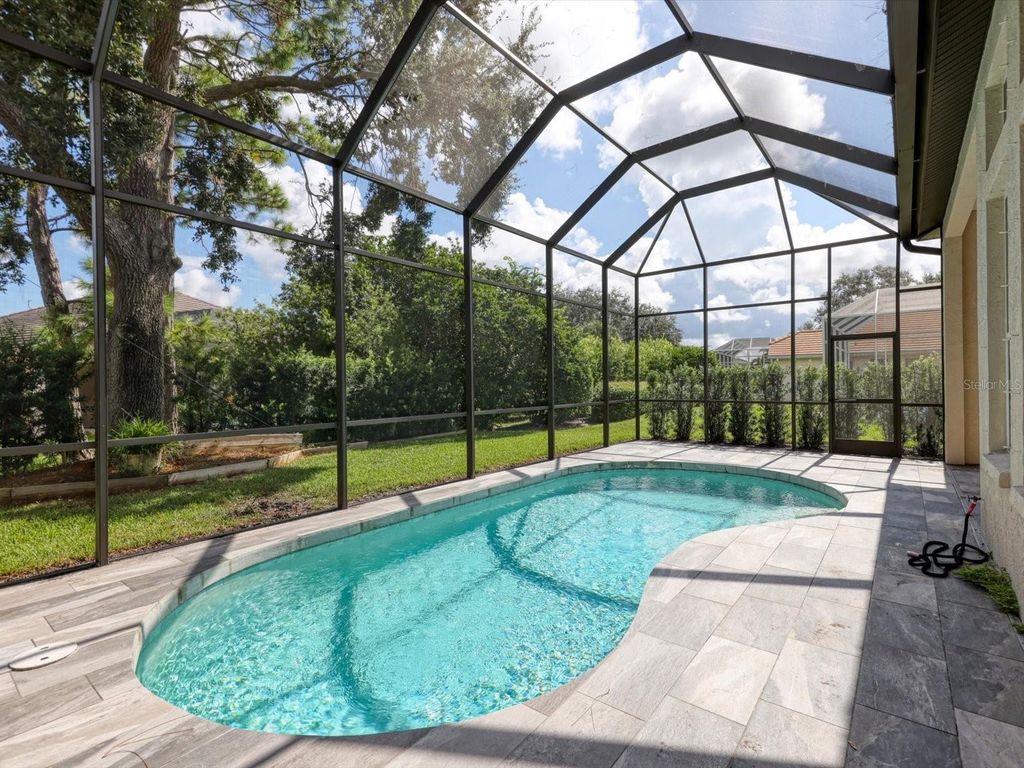 Photo of 8474 Sailing Loop, Lakewood Ranch, FL 34202 (MLS # A4664075)
