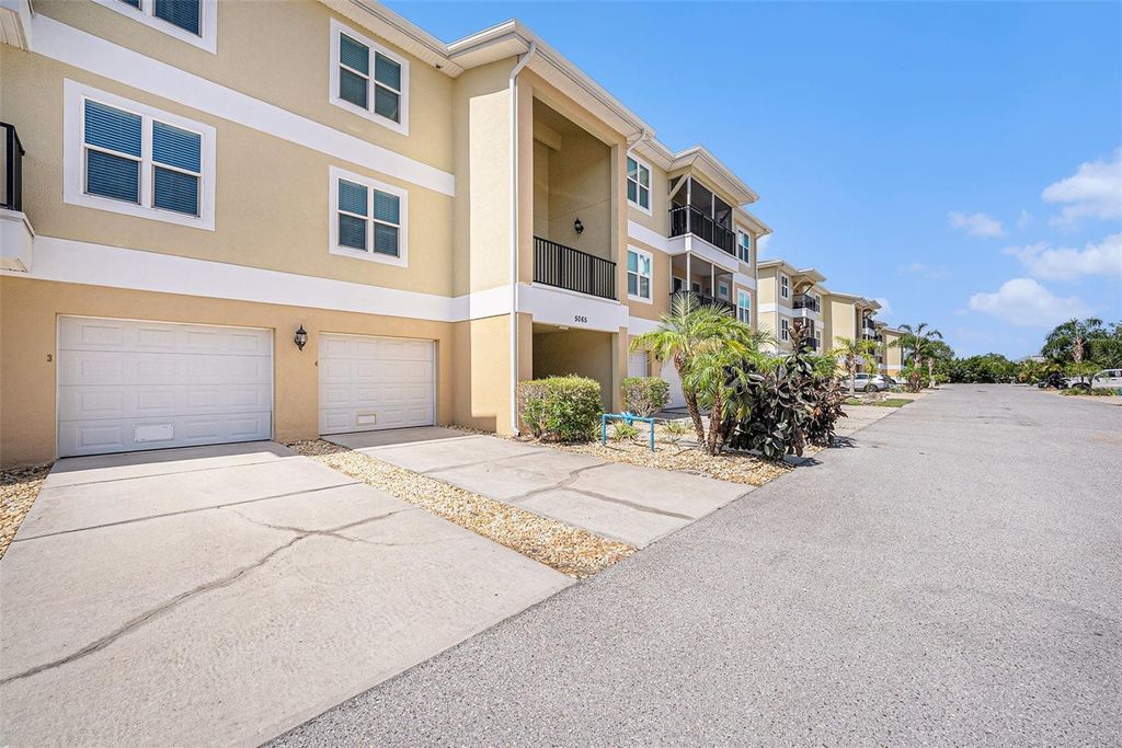 Photo of 5065 Royal Palms Way #303, New Port Richey, FL 34652 (MLS # TB8396140)