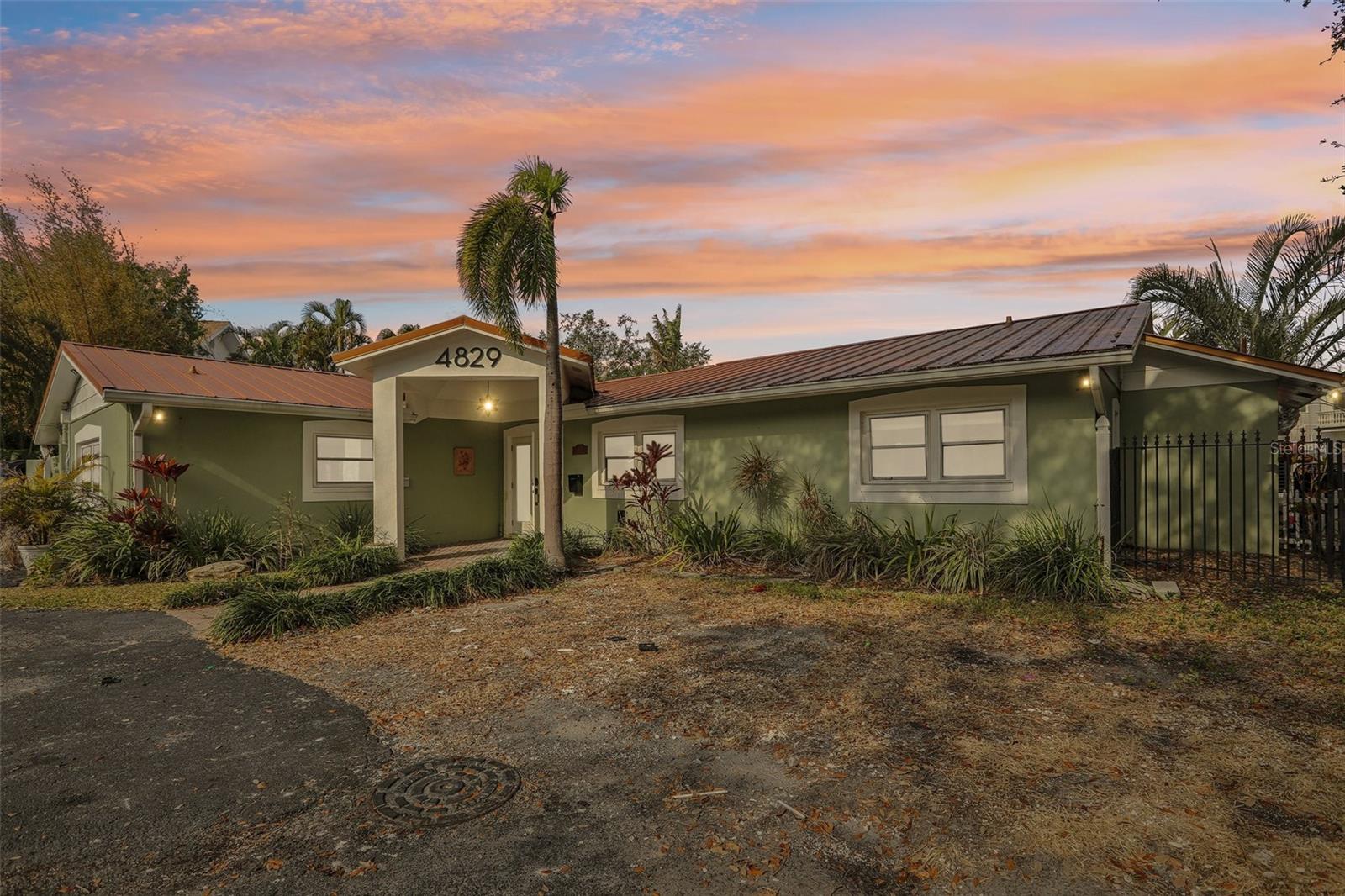 Tucked away down a private drive, this rare waterfront property in South Tampa’s coveted Sunset Park neighborhood offers direct access to Tampa Bay and breathtaking water views. Though the existing home has sustained damage from recent hurricanes, this presents a prime opportunity to remodel or rebuild your dream home in an unbeatable location. Zoned for the highly-rated Mabry Elementary, Coleman Middle, and Plant High School. The expansive lot provides ample space for your vision, whether you’re looking to restore the current home or create a custom-built waterfront retreat. Just minutes from downtown Tampa, shopping, dining, and major roadways, this hidden gem combines privacy with convenience. Don’t miss out on the chance to turn this property into your ideal South Tampa oasis! Buyer to verify zoning, permitting and FEMA requirements.