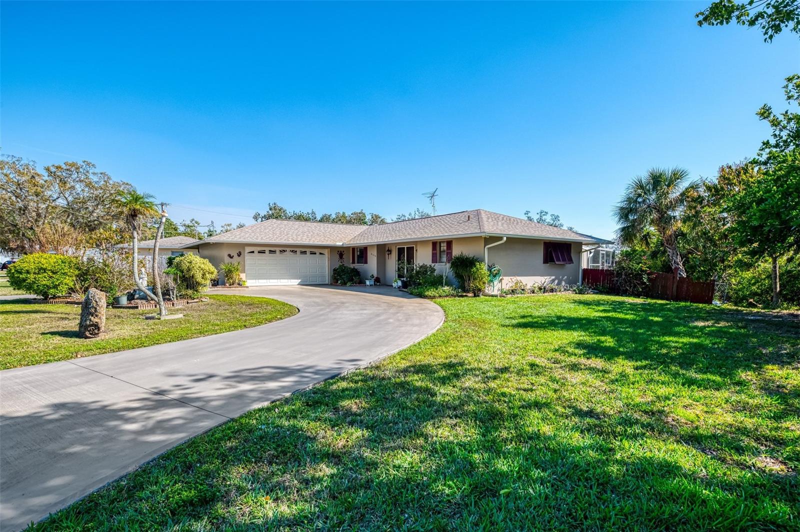 Siesta Key Minutes Away Lakefront 2BR/2BA Home with Screened Pool & No HOA. 6146 Rockefeller Ave – Privacy, Views & Exceptional Value.
Fall in love the moment you step through the French doors and are greeted by sparkling lake views and a serene screened pool. This peaceful retreat offers rare privacy—no west-side neighbor, no HOA, and a county-owned lot next door where no future homes can be built. Added in is the brand-new roof, and you’ve found unmatched value just minutes from world-famous Siesta Key Beach.
This 2 bedroom, 2 bath home features 1,868 sq ft under air (2,444 total sq ft) on a generous 10,199 sq ft lot, with a spacious 2 car garage and a circular driveway. It’s move-in ready with new 2024 GE kitchen appliances and a quiet Bosch dishwasher.
What You’ll Love:
• Expansive lake and pool views from ~45 feet of sliding glass doors (12-panel lanai + 4-panel living room),
• Huge screened lanai (30x11 and 15x7) perfect for morning sunrises,
• Private pool (20x12) for year-round enjoyment,
• Open living room (20x20) and dining area (12x5) with stylish wood-look flooring,
• Spacious primary suite (18x13) with ensuite bath, walk-in closet, and direct pool access,
• Second bedroom (14x12.5) with walk-in closet,
• Oversized garage (24x23) with 2020 opener,
• Ample storage, hallway pantry (8x2.5), and extra yard space for boat or RV parking,
This is more than just a home—it's a private lakefront retreat in one of Sarasota’s most convenient and desirable locations.
*No HOA* Lakefront - POOL - HOME - 2025 New Roof
