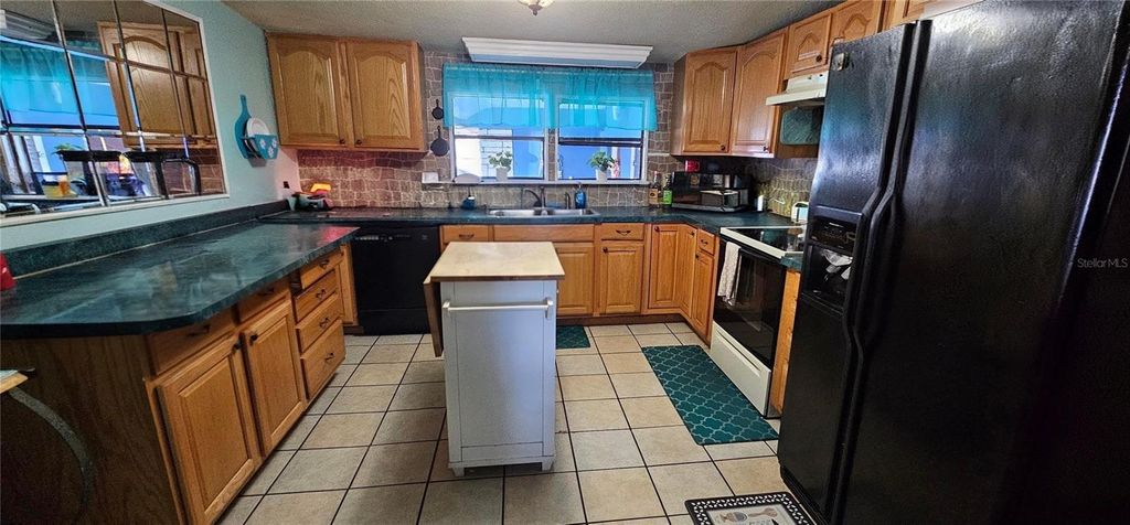 Photo of 5040 70th Avenue N, Pinellas Park, FL 33781 (MLS # O6386909)