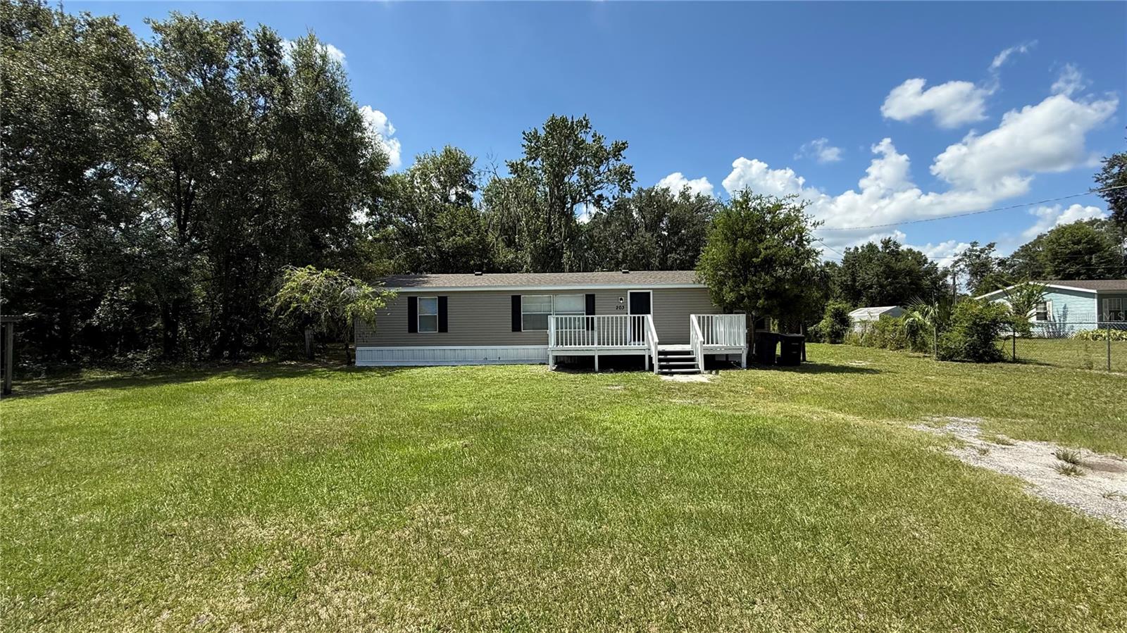 Welcome Home to this 3 bedroom/2 bath home on a spacious 1-acre lot. LVP flooring throughout and freshly painted makes this one move-in ready! NEW kitchen with granite counters, fixtures, cabinets, lighting, and newer stainless appliances. Primary bath features double vanities, tiled walk-in shower, skylights, new fixtures and lighting. Enjoy the deck for relaxing, reading or recreation. Ample room for your outdoor toys, think RV, Boat, FUN FUN FUN. Love where you live!
