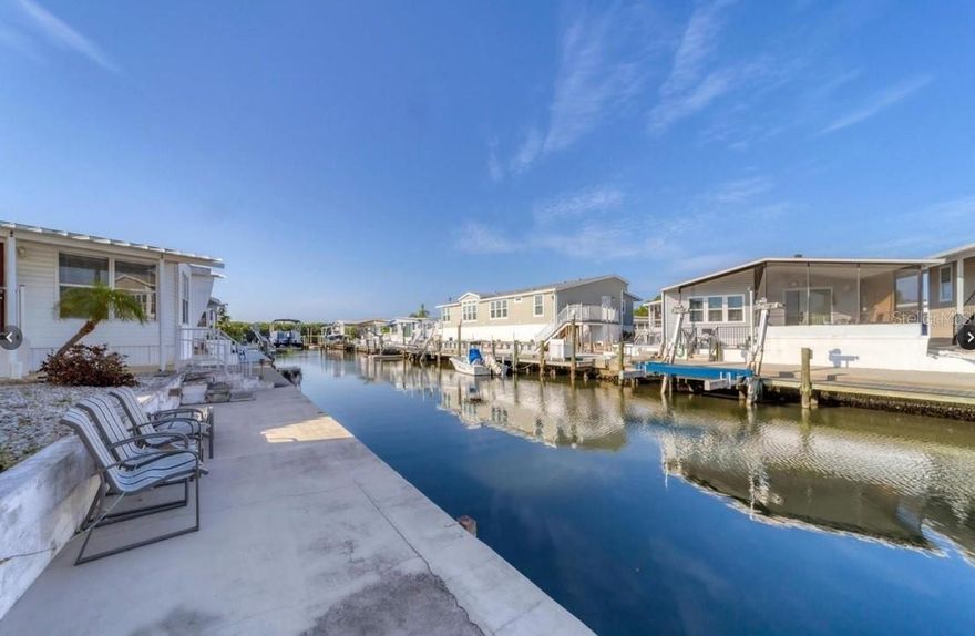 Price Drop! Own the Lot – No Lot Rent! Owner Financing Available!

6916 E Bayou Lane, Bradenton, FL – 55+ Trailer Estates Community

New Price: $345,000 (Previously $355,000!)
Lot-Only Price: $300,000
Unit & Furnishings: Just $45,000!

Boat Slip Installation Possible!

Space Available for a Boat Slip up to 26 Feet – A permit is required, but the county has confirmed it is approvable.

Direct Water Access – Launch your boat right from your property for easy access to Sarasota Bay and beyond!

Rare Waterfront Opportunity – Fully Remodeled & Furnished!

This turnkey 2-bedroom, 2-bathroom home offers direct open water access to Sarasota Bay, making it one of the last and only available properties of its kind in the highly sought-after Trailer Estates 55+ waterfront community.

? Own the Lot – No Lot Rent!
? Fully Remodeled & Move-In Ready!
? Turnkey Furnished – Just bring your suitcase!
? New AC System – Two brand-new split AC units installed.
? Floor Replaced After Hurricane – Modern & fresh upgrades.
? New Master Bath – Stylish & upgraded for comfort.
? Hurricane-Proofed – Survived two major hurricanes with all necessary repairs completed.
? Walls Dried & Treated – No replacement necessary, but optional for new owner.

Premier Waterfront Location:

? Direct Bay Access – Just six houses from the bay, offering stunning water views and immediate boating access.
? Boat Lift Opportunity – A negotiable boat lift option enhances your waterfront lifestyle.
? Outdoor Living – Private side deck overlooking the water, perfect for enjoying morning coffee or evening sunsets.

Resort-Style Community Amenities:

? Private Marina & Beach – Enjoy exclusive access to a stunning marina and private beach.
? Heated Pool & Hot Tub – Relax in resort-style amenities year-round.
? Fully Equipped Gym & Woodshop – Stay active and creative.
? Pickleball, Shuffleboard, Kayaking & More! – Endless activities for all interests.
? Social Lifestyle – Clubs, dances, and community events ensure there’s always something happening.
? Convenient Location – Onsite U.S. Post Office & just 7 minutes to SRQ Airport.

Price & Financing Options:

Lot-Only Price: $300,000
Unit & Furnishings: $45,000 – A Steal!
Total Price: $345,000

Owner Financing Available:
• 20% Down Payment
• 8.5% Interest Rate
• Maximum 15-Year Term

HOA & Community Details:

? $50 HOA Application Fee – Approval required.
? 55+ Age Requirement – At least one resident must meet the minimum age for residency.

Boater’s Dream – Direct Sarasota Bay Access!

Launch your boat from your own backyard and explore the stunning waters of Florida’s Gulf Coast!

This is more than a home—it’s a lifestyle. Don’t miss this rare opportunity to own a direct waterfront property with incredible community amenities. Contact us today to schedule a viewing and make this dream property your new forever home.