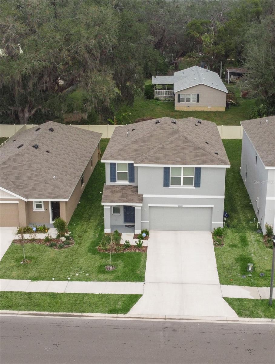 One or more photo(s) has been virtually staged. One or more photo(s) has been virtually staged. Looking for New Construction with out the wait??? Here is the perfect opportunity! Take advantage of this 2024, 3 bedroom 2 1/2 bathroom home located in the up and coming Zephyrhills area. A short 40 minute commute to downtown Tampa, an even shorter commute to the Wesley Chapel area which provides a variety of shopping, dining and entertainment options. The first floor has tile throughout, half bath, kitchen with granite countertops and stainless steel appliances. Great room with eat-in kitchen area. All bedrooms on the second floor which features a loft area (perfect for office space or sitting room) granite countertops in all bathroom, walk-in closet in primary bedroom. Master bathroom has double vanity, walk in shower and separate water closet. Looking to move quickly? Here's your opportunity!!