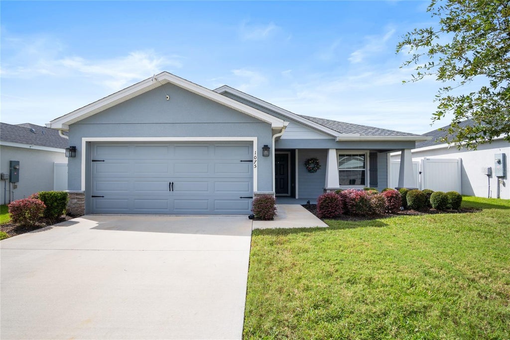 Photo of 1075 Tropea Lane, Auburndale, FL 33823 (MLS # S5159500)