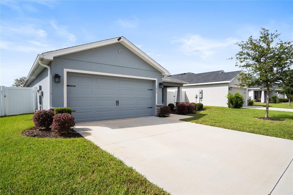 Photo of 1075 Tropea Lane, Auburndale, FL 33823 (MLS # S5159500)