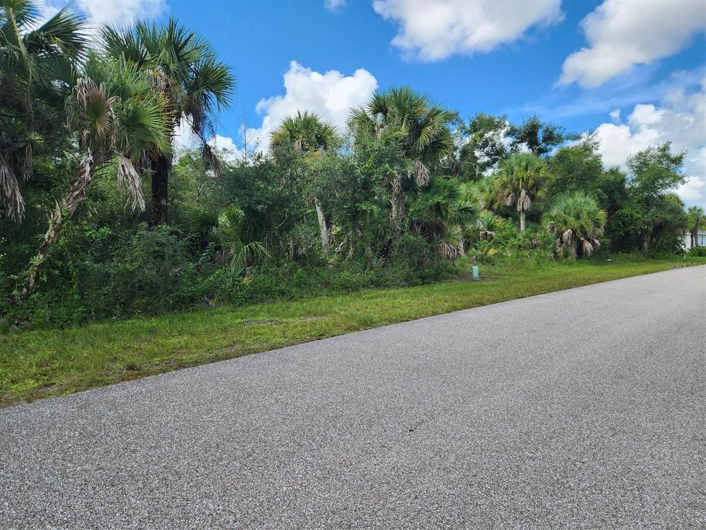 Photo of 16227 Orrick Avenue, Port Charlotte, FL 33954 (MLS # C7497103)