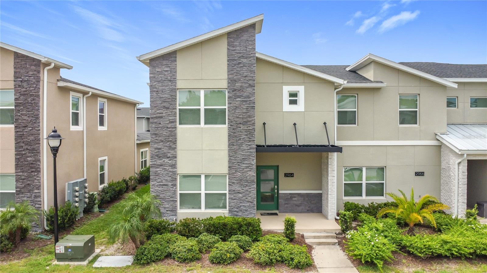 Located in the heart of Storey Lake, one of Central Florida’s most desirable and profitable short-term rental communities, this stunning 5-bedroom, 4-bathroom townhome combines luxury, location, and unforgettable vacation appeal. Just 15 minutes from Walt Disney World and a short drive to Universal Studios, world-class dining, shopping, and entertainment, this property is perfectly positioned for maximum rental visibility and performance. Built in 2021, the home offers over 2,100 square feet of thoughtfully designed living space with high-end finishes throughout. From the moment guests walk in, they’ll be drawn to the bright, modern interior featuring a spacious open-concept living area, a sleek kitchen outfitted with stainless steel appliances and quartz countertops, and a seamless flow to the private, screened-in pool area—ideal for relaxing after long park days. Themed bedrooms take this property to the next level, with a Frozen-inspired room and an action-packed Superhero room that create magical moments and social-media-worthy memories for families and vacationers alike. This home not only captures the essence of the Central Florida vacation lifestyle, but it also delivers impressive income potential. As part of the amenity-rich, gated Storey Lake community, owners and guests enjoy exclusive access to two resort-style clubhouses with lazy rivers, sparkling pools, fitness centers, tiki bars, mini-golf, and playgrounds—all in a gated, family-friendly environment that keeps guests coming back year after year. Whether you're looking to expand your STR portfolio or secure an income producing second home in a proven location, don’t miss your chance to own in one of Kissimmee’s most competitive and sought-after resort neighborhoods.